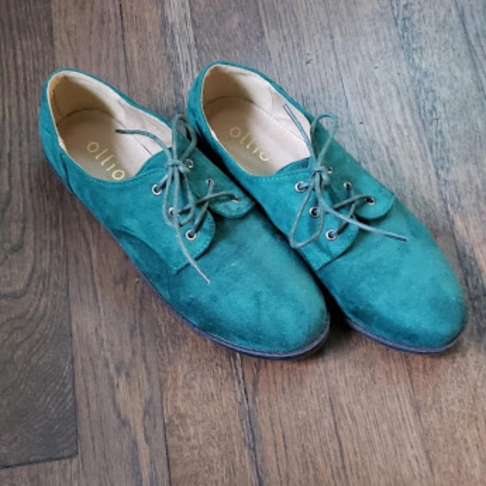 Green lace-up shoes